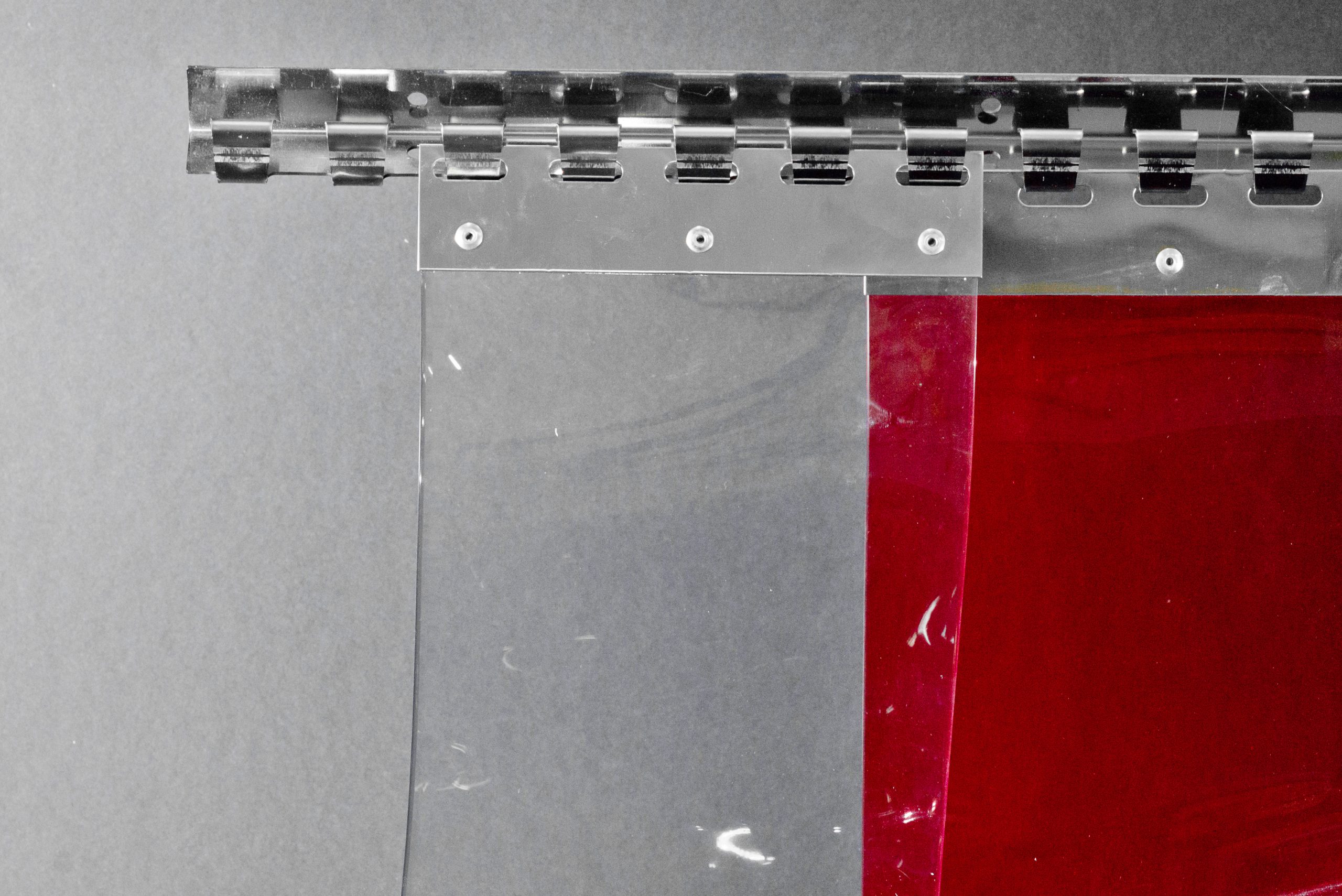 PVC curtain mounting rail with two strips - clear transparent and welding red
