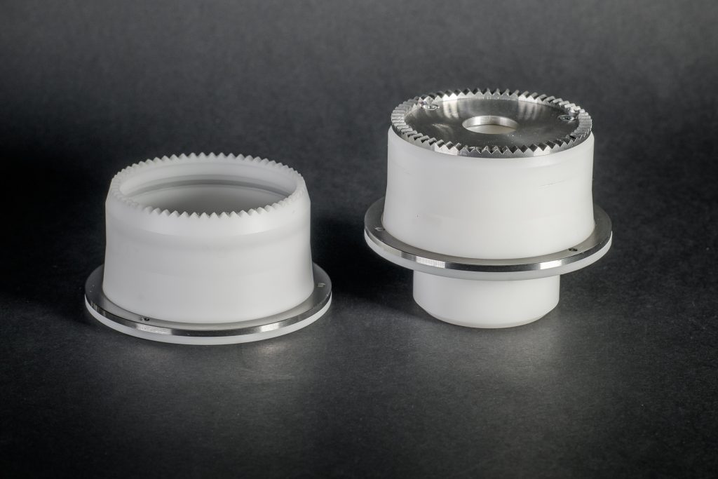 Two composite gears with POM bodies and steel rims - drives for packaging machines